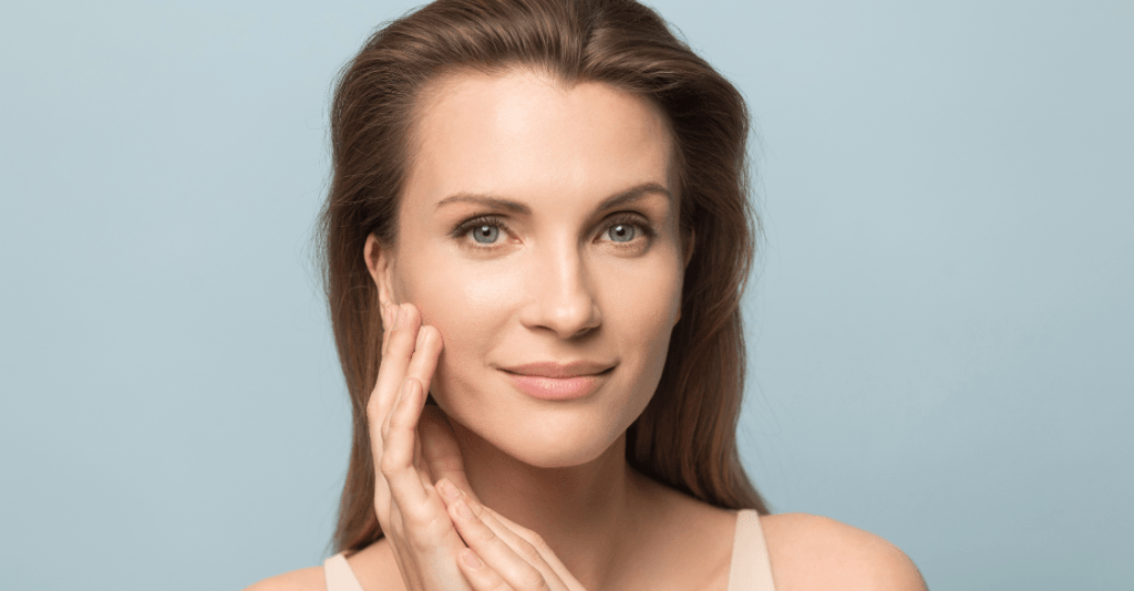 Woman touching her face